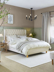 Drifly wingback bed with 48 inch upholstered headboard and wooden legs in neutral modern bedroom