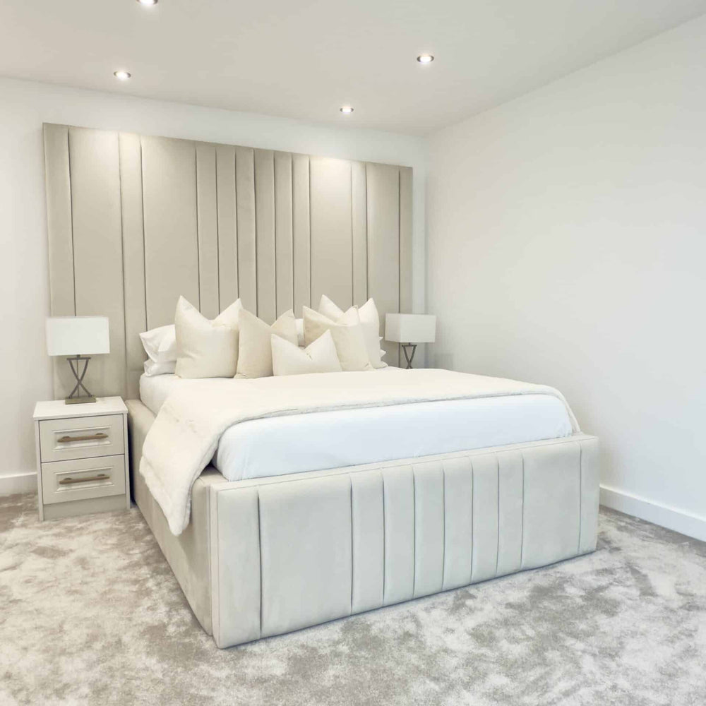 Slatum Luxury Bed – tall winged velvet headboard with deep tufting and plush cream upholstery, elegant designer bed frame UK