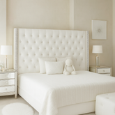 duct photos)
• White luxury wingback bed with storage
• Diamond tuft upholstered bed in white
• Gas lift storage bed open compartment
• Modern white bedroom with upholstered bed