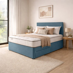 Blue bed frame with beige bedding in a bedroom setting